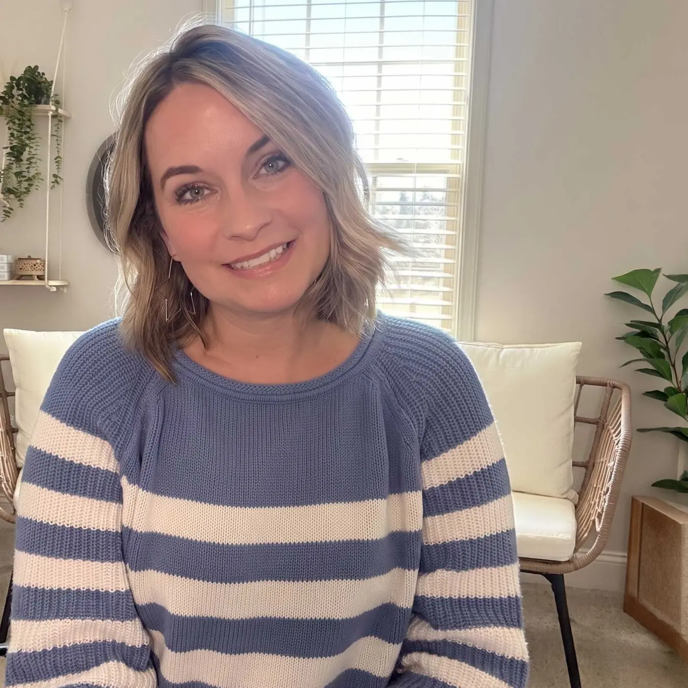 Jessica English at home, looking toward the camera.